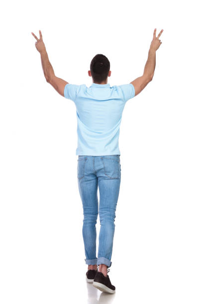istock man raising his hands as a sign of peace 1214268534