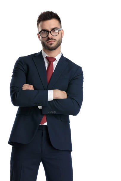 istock businessman standing with arms crossed and striking a pose 1214269570