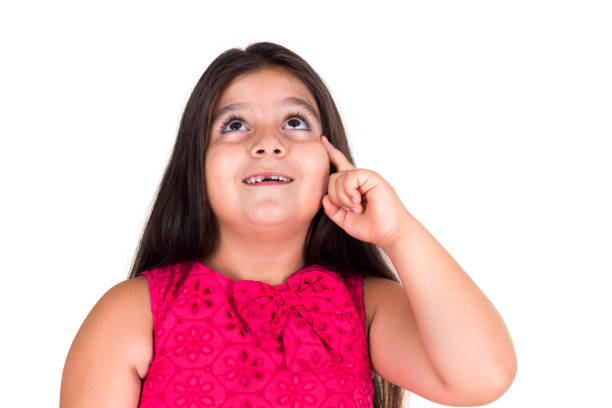 Little girl looking up on white background