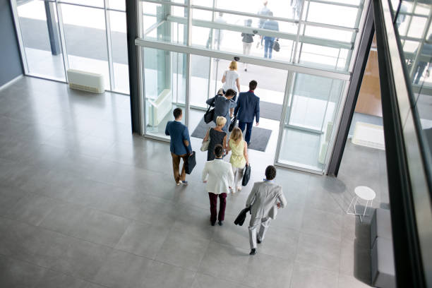 istock group of business people walking from building 1214270974
