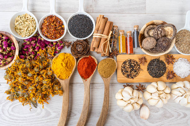 istock Colourful various herbs and spices for cooking on  background 1214273887