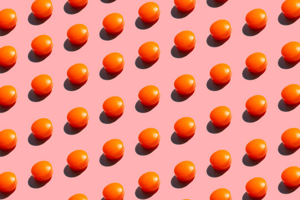 istock Many orange Pills on pink pop art Background 1214274205