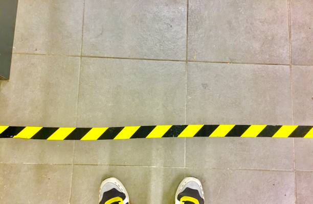 Waiting in line complying with social distancing rules