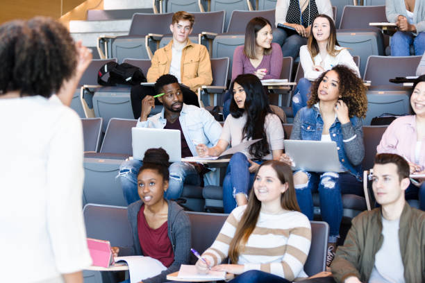 istock Attentive student listening to college professor 1214279023