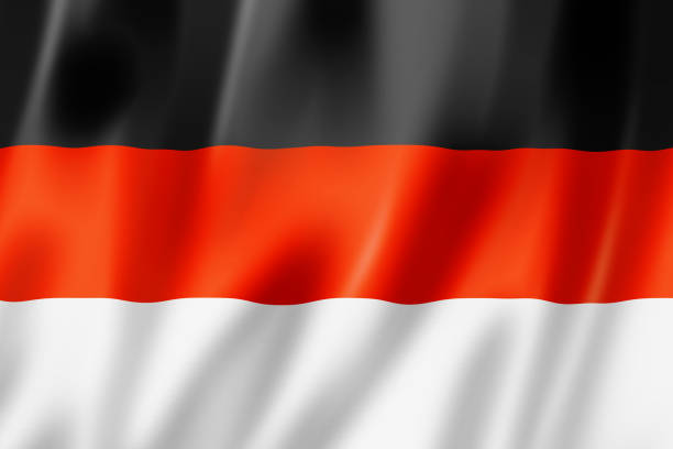 Germany, Berlin, February 23, 2024 - German flag against cloudy sky, Berlin central