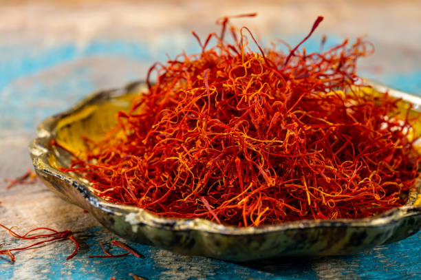 istock Real red dried shaffron spice close up 1214286001