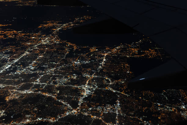 istock Night view of city from airplane 1214289348