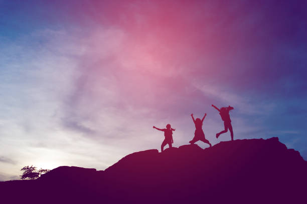 istock Silhouette of team leadership, teamwork and teamwork and delightful silhouette concepts 1214289622
