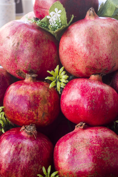istock Pomegranate one by one pink, fresh in market. 1214289732