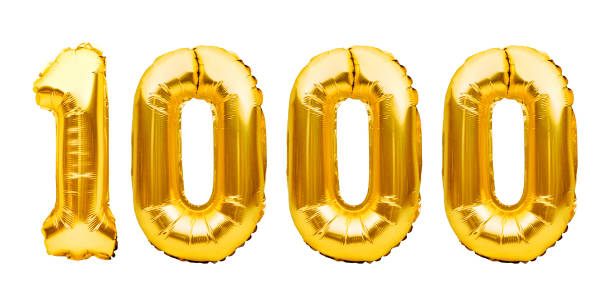 Number 1000 one thousand made of golden inflatable balloons isolated on white. Helium balloons, gold foil numbers. Party decoration, 1000 subscribers or followers and likes Number 1000 one thousand made of golden inflatable balloons isolated on white. Helium balloons, gold foil numbers. Party decoration, 1000 subscribers or followers and likes. number 1000 stock pictures, royalty-free photos & images
