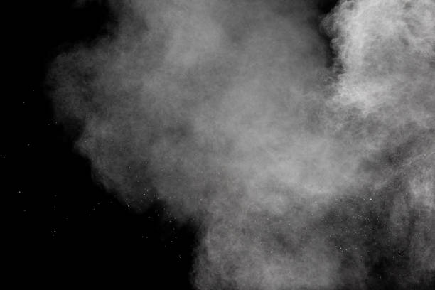 istock Abstract white powder explosion against black background.White dust cloud in the air. 1214290606