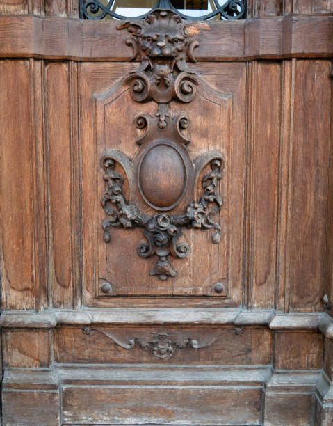 istock old wooden front door with lion ornament 1214291022