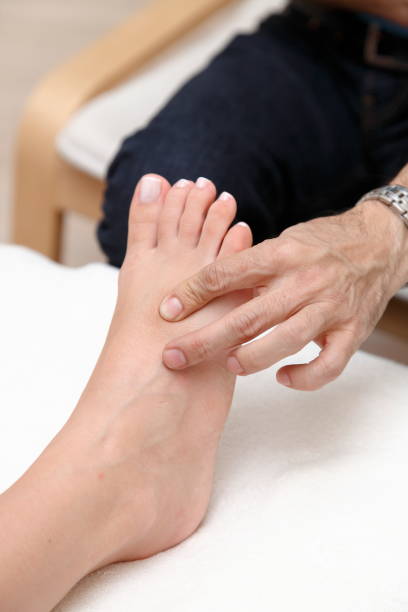 istock massage therapy for foot health 1214291215