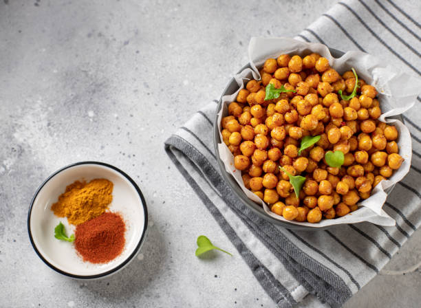 istock spicy fried chickpeas. vegan healthy snacks. 1214293241