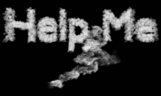istock smoke letter of Help Me on black background,3D rendering 1214294635
