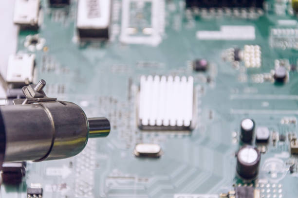 istock engineer use hot air blower to repair television board 1214294833