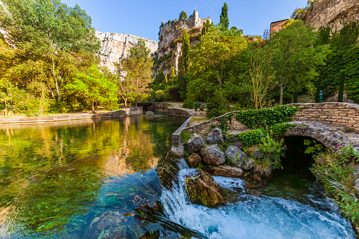 The source of the Sourge River is located next to the small medieval town of Fontaine de Vaucluse