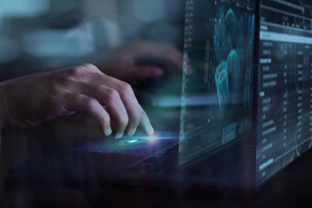 istock hand uses virtual reality technology to see futuristic or augmented reality images with computer 1214297812