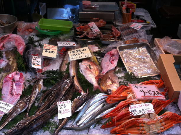 istock Fresh fish on a market stall in Osaka Japan 1214297944