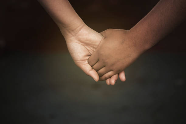 istock Men and women shake hands to express love 1214300051