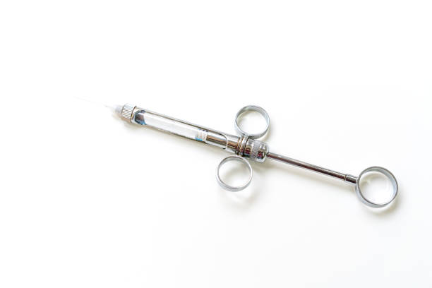 istock Dental instruments on a white background, syringe 1214300077
