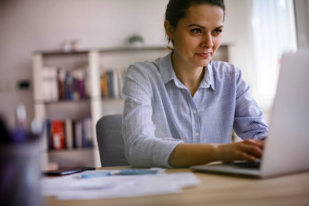 istock Woman working at home 1214304545