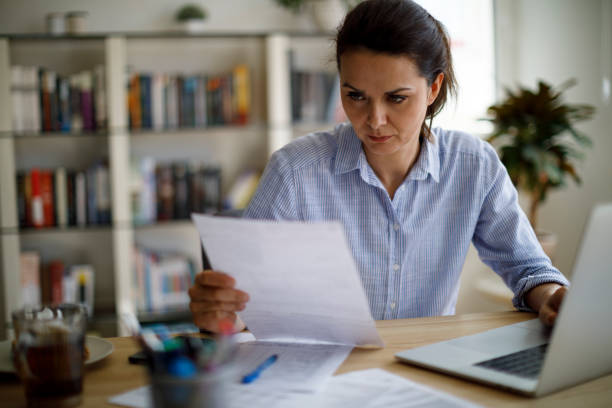 istock Mature woman working from home 1214305426