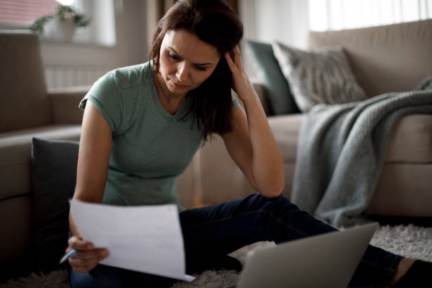 istock Mature woman working from home 1214306999