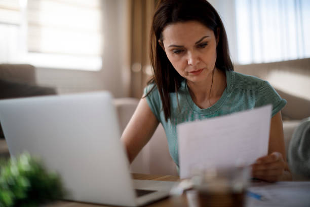 istock Mature woman working from home 1214307153