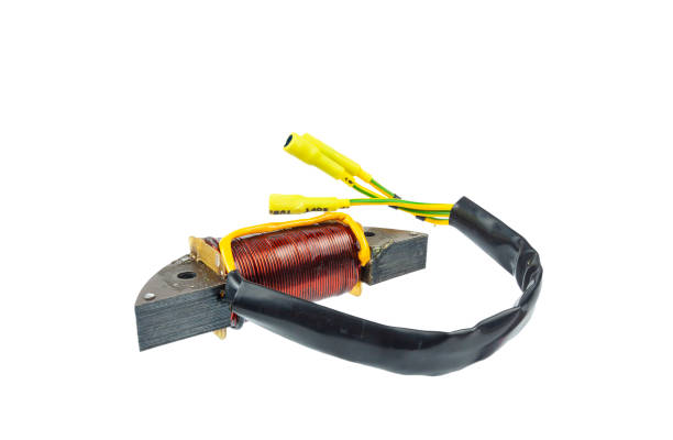 istock A generator coil for an outboard motor on a white background close-up. 1214313667