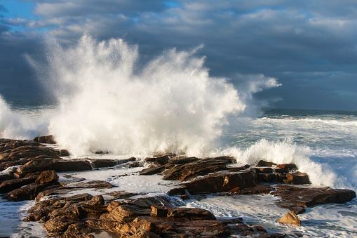 Waves crashing on the rocks on the coastline in South Africa
