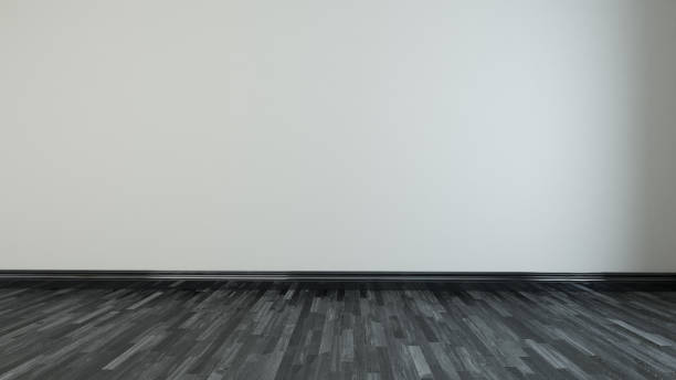 istock Light brown wall empty room with black wooden floor 3D rendering 1214314075