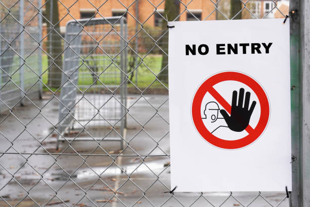 istock Closed sports ground with no entry sign 1214314466