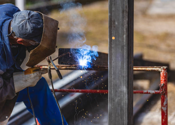 istock Eastern Europe Worker Welding at Construction Site 1214315688