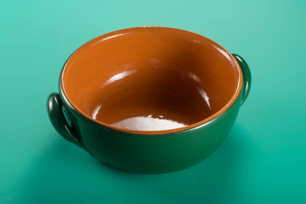Empty Green earthenware casserole typical of Tuscany with clipping path