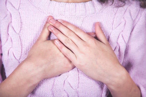 istock woman hand in heart 1214318663