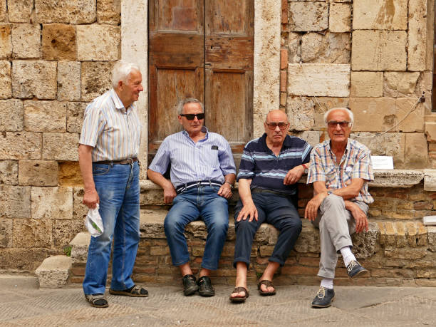 Diyarbakır,Turkey - September 19, 2010: Anatolian men in her local dress talking in front of Ulu Cami (Mousque) in Diyarbakır
