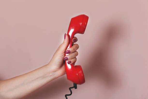istock woman hand vintage phone 1214319661