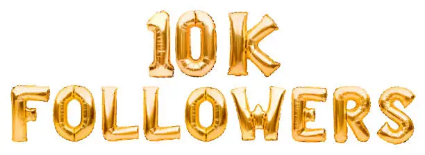 Photo of Words 10K FOLLOWERS made of golden inflatable balloons isolated on white. Helium balloons gold foil letters forming phrase10k followers. Social media, likes and subscribes, communication concept.