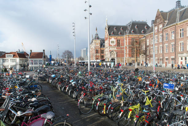 istock Bicycle parking in front of Amsterdam Central railway station. 1214322359