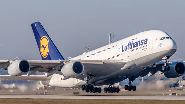 Airbus A380 Lufthansa takes off from Munich Airport Munich, Germany - December 12, 2019: An Airbus A380-841 from Lufthansa takes off from Munich Airport. The aircraft with registration D-AIMH has been in service for the German airline since July 2011. munich airport stock pictures, royalty-free photos & images