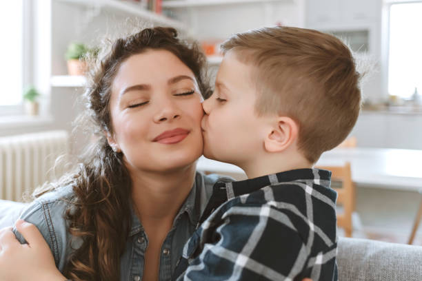 istock Mom’s cuddles are best of all 1214324216