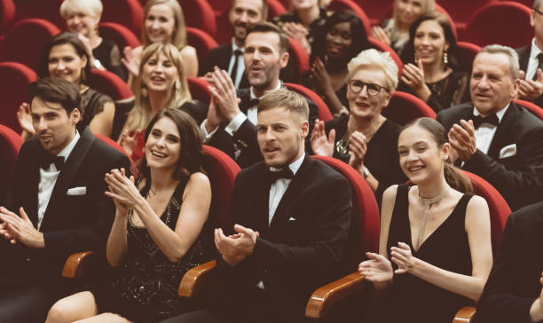istock Excited audience clapping in opera house 1214324943
