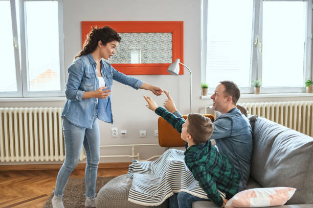 istock Happy Family Playing Charades 1214324947