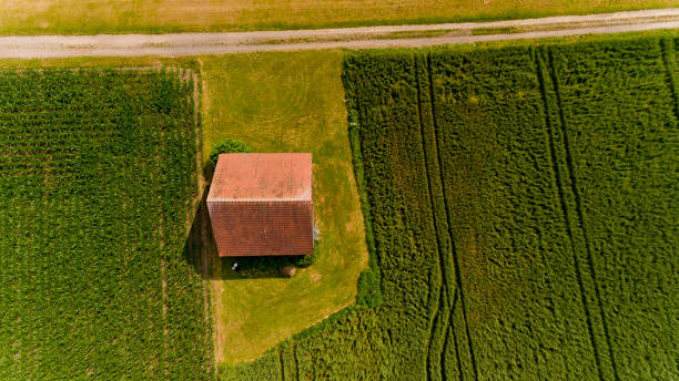 istock Top view on a barn in the field. Neu-Ulm, Germany. 1214325520