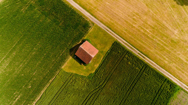 istock Top view on a barn in the field. Neu-Ulm, Germany. 1214325523