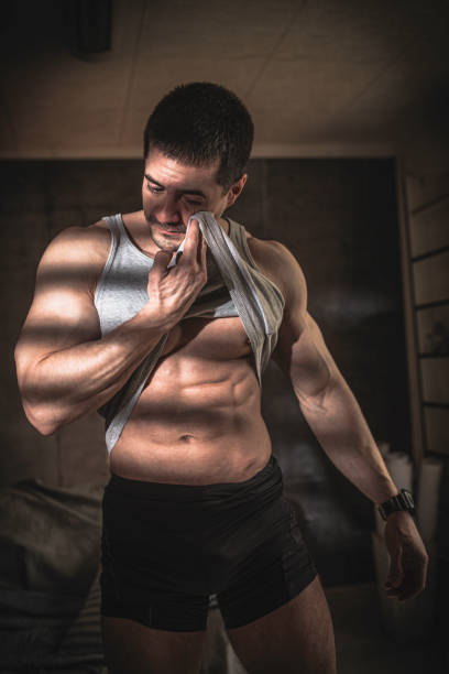istock Men waking up from bed in the morning and preparing for training 1214326371