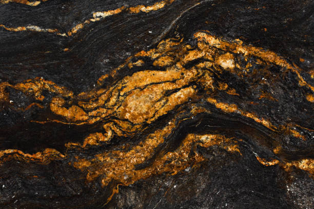 istock Natural orange red, black, gray marble texture close-up. 1214326682