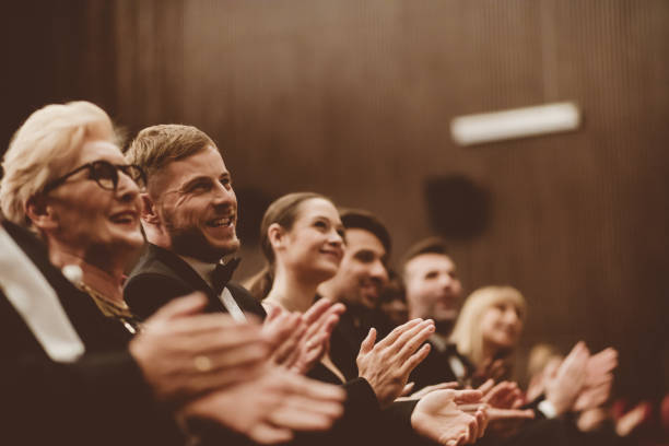 istock Excited audience clapping in the theater 1214326805