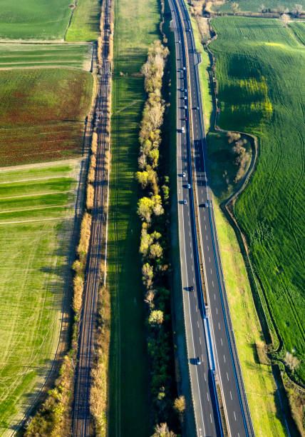 Aerial view of highway in the country Aerial view of highway in the country filming point of view highway day road stock pictures, royalty-free photos & images